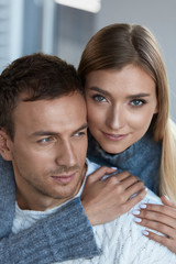 Romantic Couple. Beautiful Woman And Handsome Man In Sweater