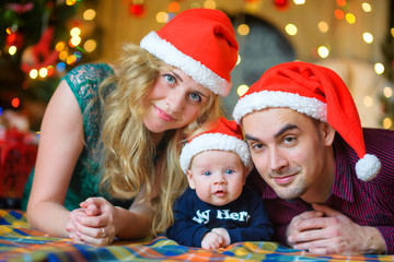 Happy family together with the newborn son