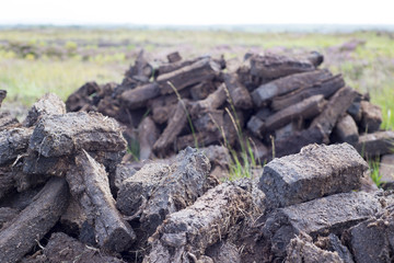 peat stacked up for the bog winds to dry