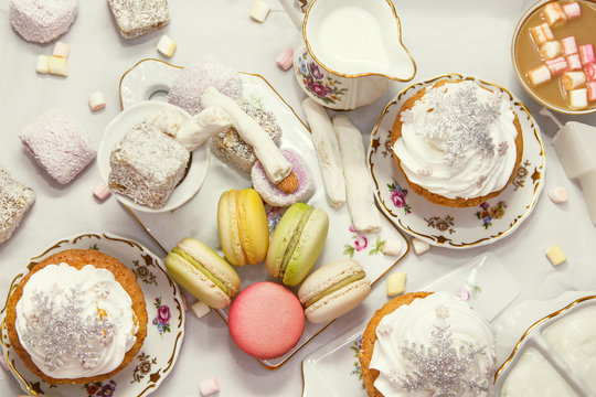 Winter table appointments with macaroons and sweets