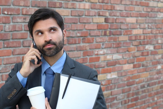 Man experimenting nervousness during phone call