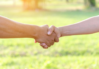 Two man, friend hand shake meeting outdoor