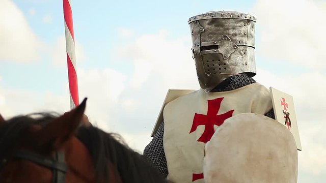 Medieval knights on horseback.