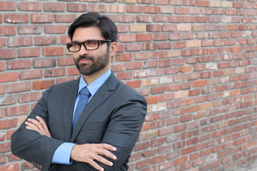 Cheesy stereotypical fake businessman with arms crossed 