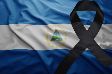 flag of nicaragua with black mourning ribbon