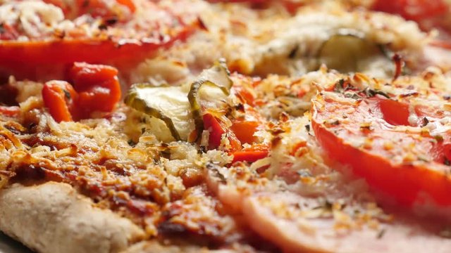 Hulled dinkel wheat vegetarian pizza texture close-up 4K 2160p 30fps UltraHD tilting footage - Italian food of Triticum spelta wheat gluten-free dough 3840X2160 UHD tilt video 