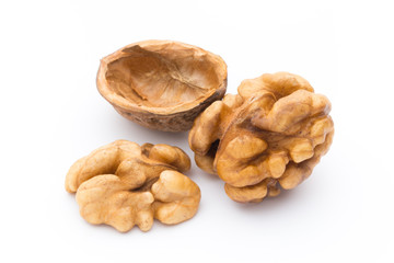 Walnut and walnut kernel isolated on the white background.