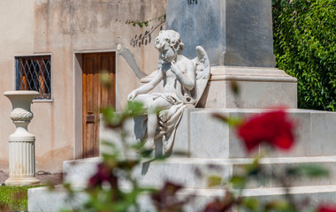 Sculpture of an angel on a street in the old city center in Noto, Sicily