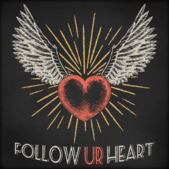 Hand drawn vector sketch illustration - creative vintage valentines day love card design, heart with sunburst and wings, black chalkboard background.