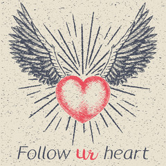 Hand drawn vector sketch illustration - creative vintage valentines day love card design, heart with sunburst and wings, grunge paper background.