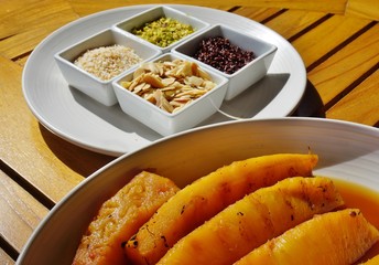 Slices of roasted caramelized pineapple in caramel sauce