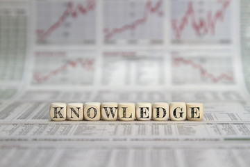 Knowledge word on business newspaper background