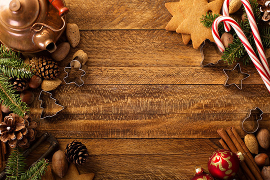 Christmas background with nuts, spices and pine tree