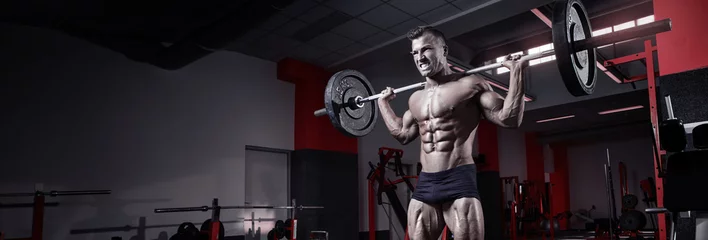 Deurstickers Muscular bodybuilder guy doing exercises with dumbbell © _italo_