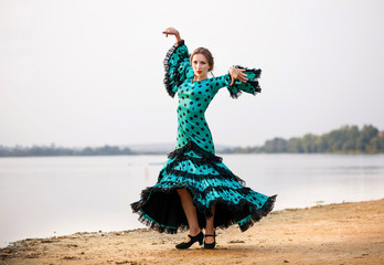 woman dancer wearing gren dress