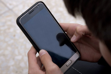 closeup of child with mobile phone