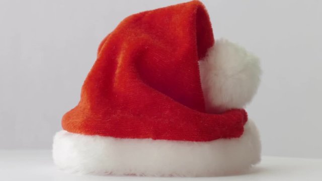 Santa Claus red hat / Father Christmas red hat on rotating white background