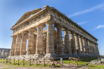 Fototapeta na wymiar Rear view of greek temple of Neptune, in the archaeological site of Paestum, Salerno, Italy