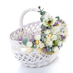 Fototapeta na wymiar decorated empty wicker basket on a white background