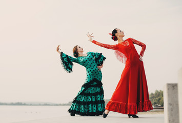 womans dancer wearing red dress - obrazy, fototapety, plakaty