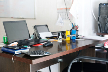 office table with PC and different stationery on it