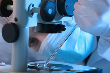 Scientist making experiments, closeup