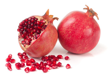 two pomegranate isolated on a white background