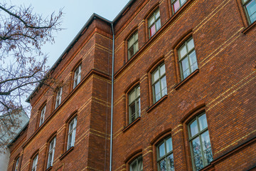 Fototapeta na wymiar old school building in a low angle view