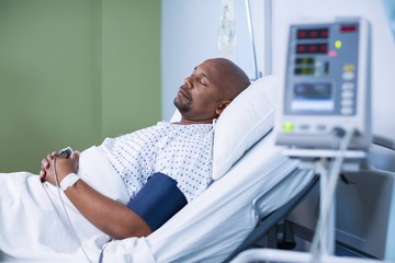 Male patient resting in ward - Powered by Adobe