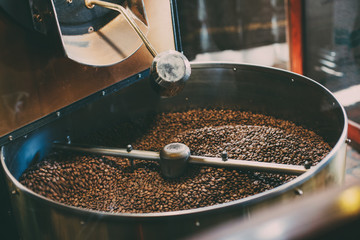 Roasted coffee in  roaster