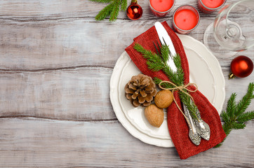 Christmas table place setting with xmas decorations, horizontal, top view, copy space