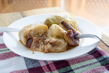 Serbian dish sarma served in white plate