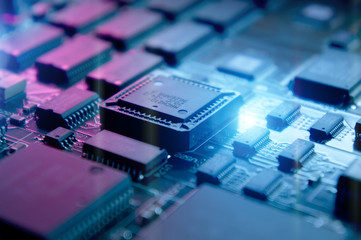 Fototapeta na wymiar Microchips on a circuit board.