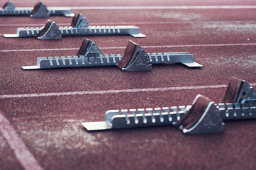 Close up of starting blocks on running track