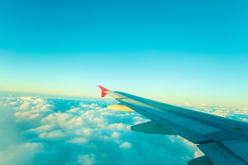 View from plane window, cloud sky