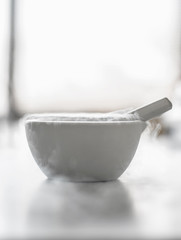 Laboratory experiment with liquid nitrogen in laboratory mortar