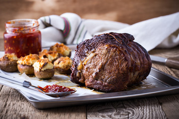 Fototapeta na wymiar Homemade rib-eye boneless roast beef