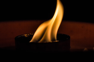 Candle flame in the dark