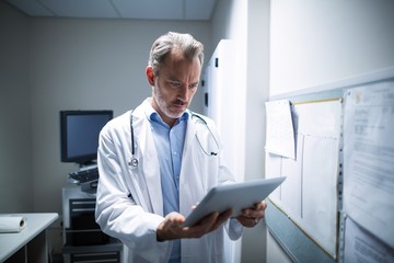 Doctor using digital tablet