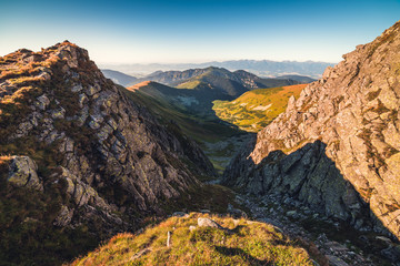 Fototapeta premium Mountain Landscape in Light of Setting Sun. View from Mount Dumbier in Low Tatras, Slovakia. West Tatras Mountains Background.
