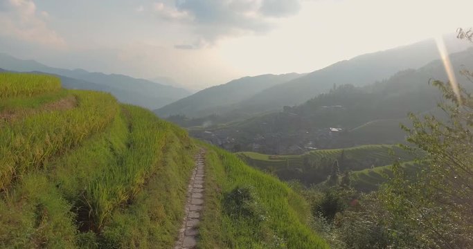 Aerial view of beautiful The Longji Rice Terraces located next to the village of Ping'an in China. UNESCO World Heritage. Freedom, travel destination, power of nature concept.