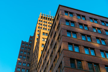 very big office building with brick facade