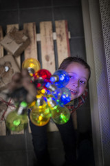 Little boy decorating home for Christmas