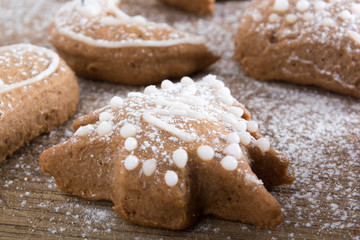 Gingerbread cookies on plate covered with sugar
