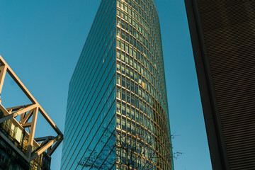 Fototapeta premium modern glass skyscraper at Potsdamer platz