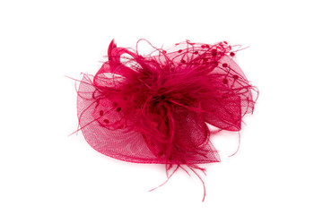 Women in red hat with a veil. Red  hair accessory with feather. Fancy, party hat. Isolated on white background. Closeup. - obrazy, fototapety, plakaty