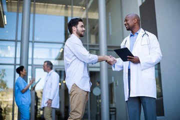 Doctor and patient shaking hands