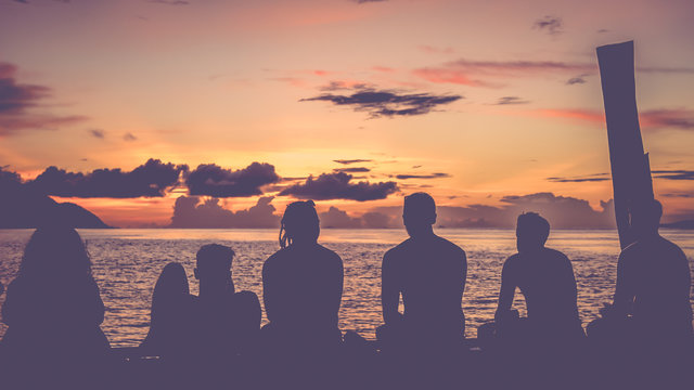 Travelers, Divers chilling at the Pier on Sunset, Kri Island. Raja Ampat, Indonesia, West Papua