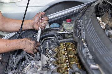 Car repair service, Auto mechanic repairing car engine