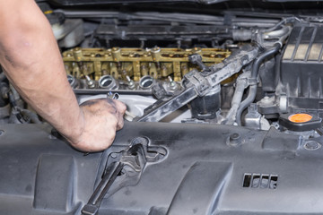 Car repair service, Auto mechanic repairing car engine